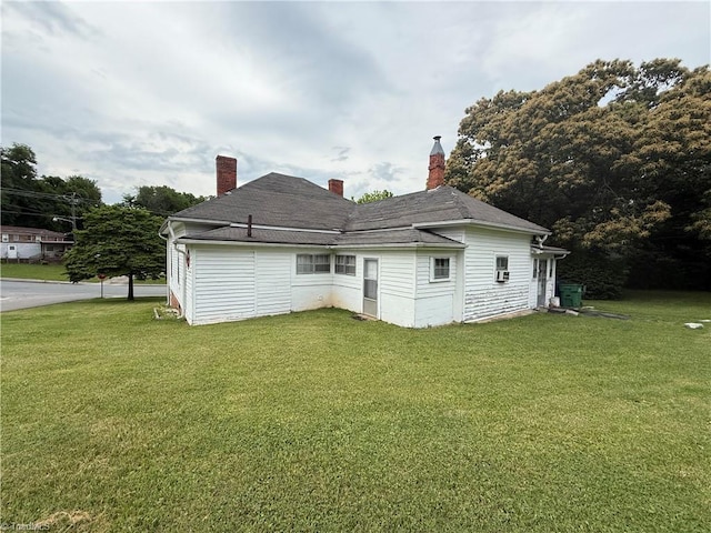535 Worth St, Mount Airy, NC 27030 - back of house featuring a yard and a chimney