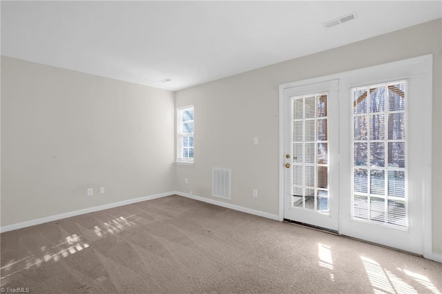 empty room with carpet floors