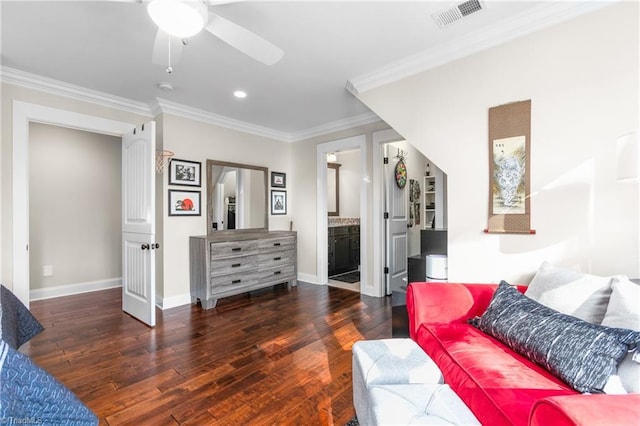 bedroom featuring ensuite bathroom, ceiling fan, ornamental molding, and dark wood-type flooring