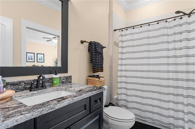 bathroom featuring vanity, toilet, ceiling fan, and crown molding