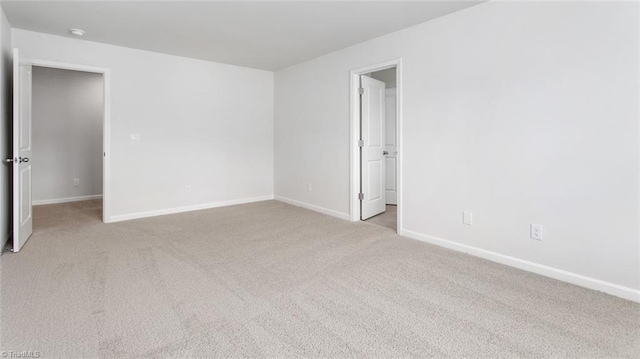 1372 Amberview Ln, Kernersville, NC 27284 - spare room featuring carpet flooring and baseboards