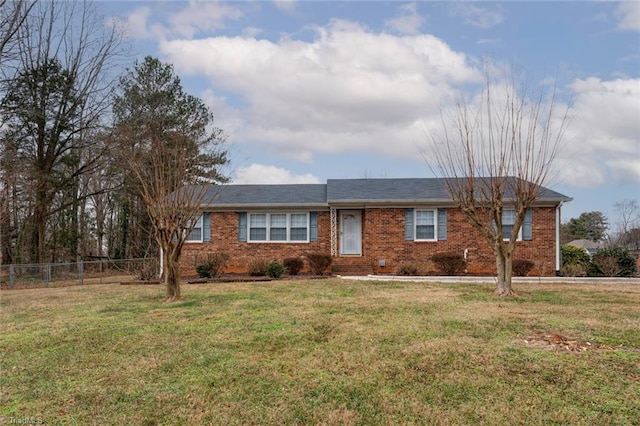 ranch-style home with a front yard