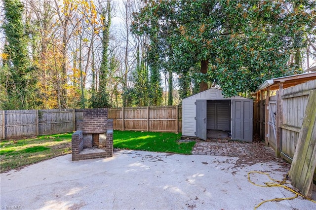 view of patio with a storage shed