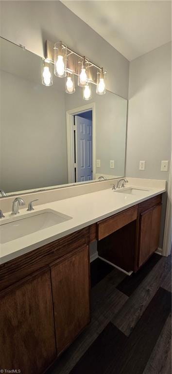 bathroom with wood-type flooring and vanity