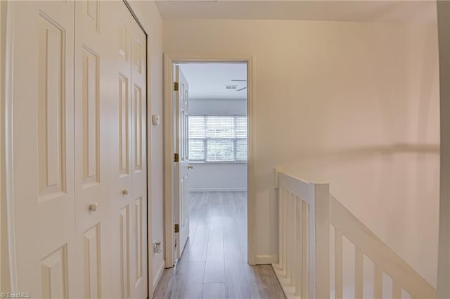 5430 Strasburg Dr, Greensboro, NC 27407 - hallway featuring light wood-style flooring and baseboards