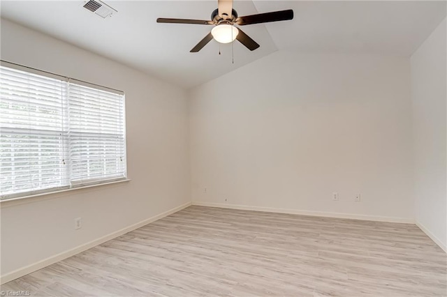 5430 Strasburg Dr, Greensboro, NC 27407 - spare room with ceiling fan, light wood finished floors, vaulted ceiling, and baseboards