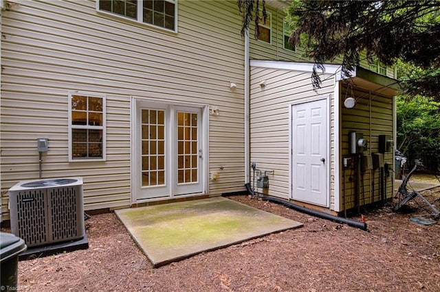 5430 Strasburg Dr, Greensboro, NC 27407 - rear view of house featuring cooling unit and a patio area