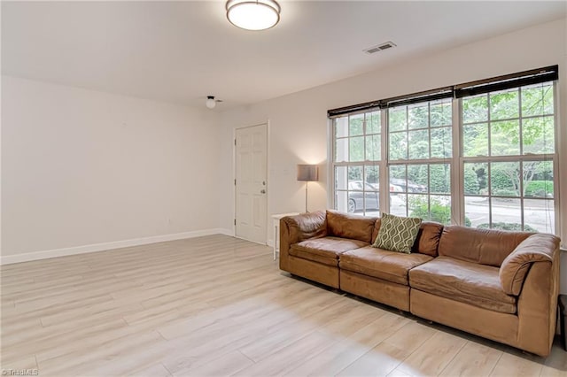 5430 Strasburg Dr, Greensboro, NC 27407 - living area with light wood-style flooring and baseboards