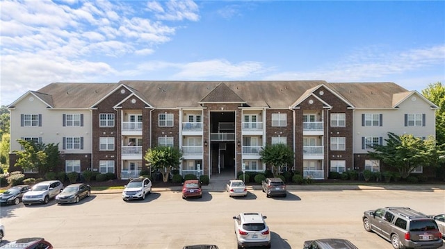 1380 Heritage Pointe Dr Unit 310, Winston-Salem, NC 27127 - view of building exterior featuring uncovered parking