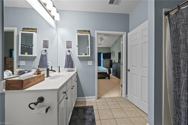 1380 Heritage Pointe Dr Unit 310, Winston-Salem, NC 27127 - bathroom featuring connected bathroom, vanity, tile patterned flooring, and a shower with shower curtain