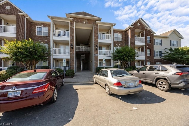1380 Heritage Pointe Dr Unit 310, Winston-Salem, NC 27127 - view of apartment building / complex with uncovered parking