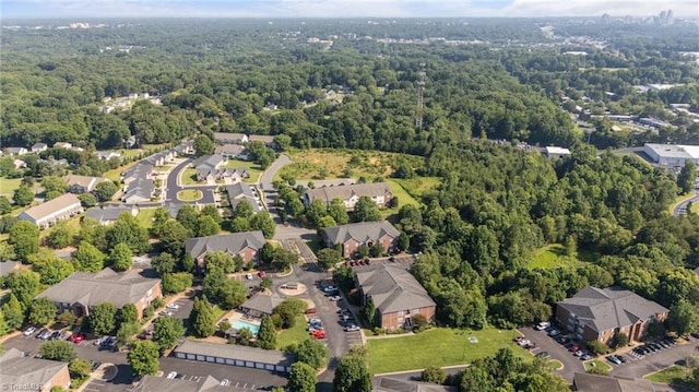 1380 Heritage Pointe Dr Unit 310, Winston-Salem, NC 27127 - aerial perspective of suburban area featuring a forest