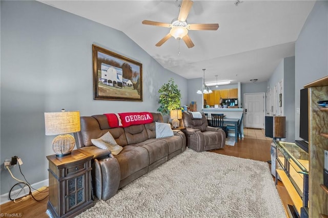 1380 Heritage Pointe Dr Unit 310, Winston-Salem, NC 27127 - living area with light wood-type flooring, ceiling fan, lofted ceiling, and a chandelier