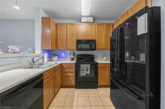 1380 Heritage Pointe Dr Unit 310, Winston-Salem, NC 27127 - kitchen featuring black appliances, light tile patterned flooring, and light countertops