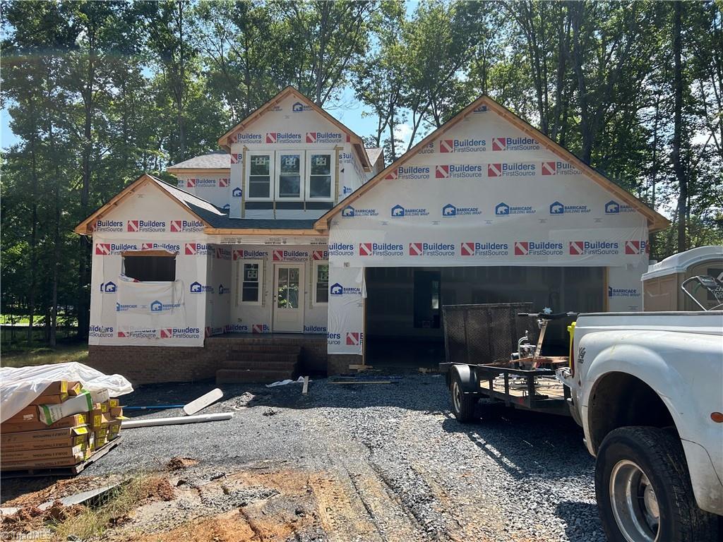 540 N Timberlea St, Liberty, NC 27298 - property in mid-construction featuring a garage