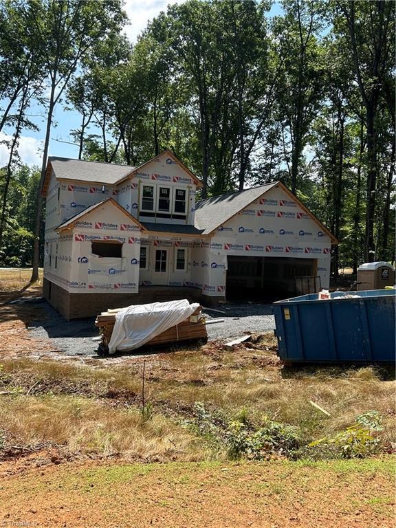 540 N Timberlea St, Liberty, NC 27298 - rear view of property featuring a garage