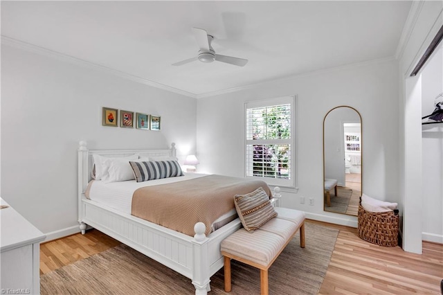 3480 York Rd, Winston-Salem, NC 27104 - bedroom with crown molding, light wood-type flooring, baseboards, and a ceiling fan