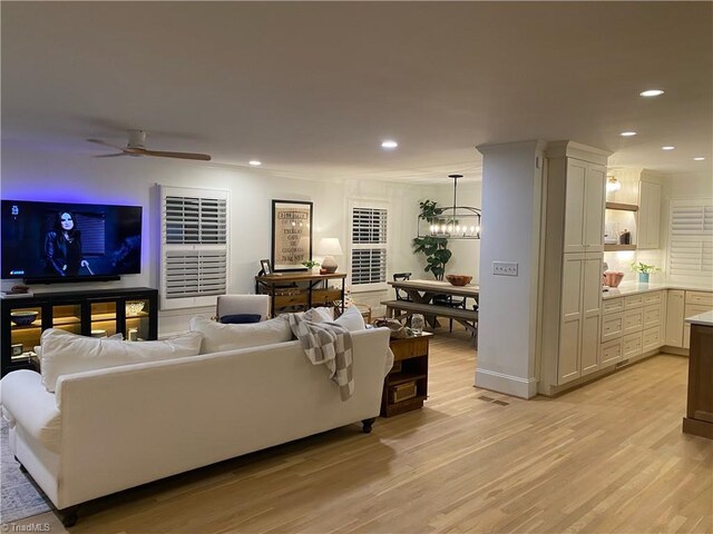 3480 York Rd, Winston-Salem, NC 27104 - living room with a chandelier, recessed lighting, light wood-style flooring, and a ceiling fan