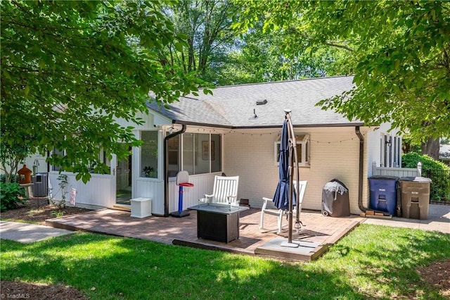 3480 York Rd, Winston-Salem, NC 27104 - back of property featuring brick siding, a patio area, and roof with shingles