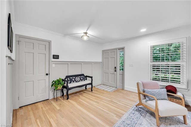 3480 York Rd, Winston-Salem, NC 27104 - entryway with ornamental molding, wood finished floors, a wainscoted wall, and a decorative wall