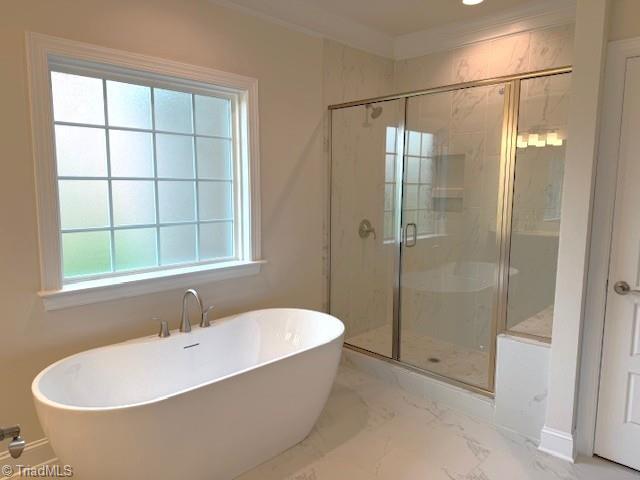 7607 Valhalla Way Lot 20, Greensboro, NC 27409 - bathroom featuring a stall shower, marble finish floor, and a soaking tub