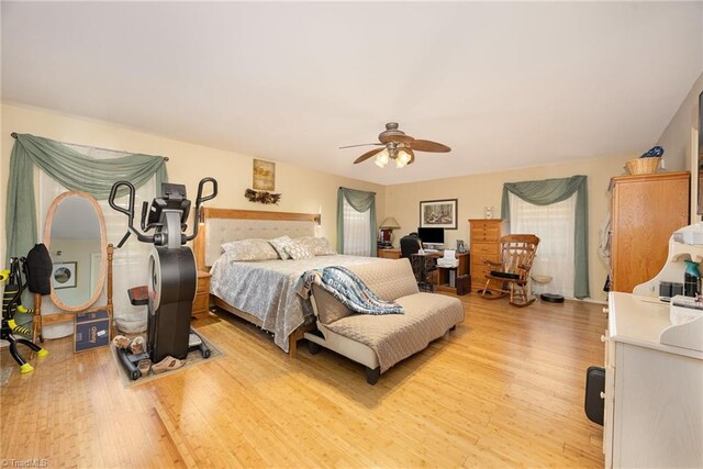 1973 Old Mountain Rd, Thomasville, NC 27360 - bedroom with light wood-style flooring and ceiling fan