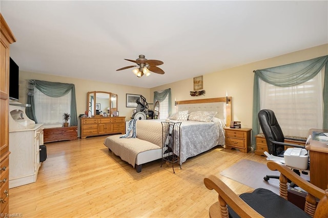 1973 Old Mountain Rd, Thomasville, NC 27360 - bedroom featuring light wood-style flooring, ceiling fan, and an office area