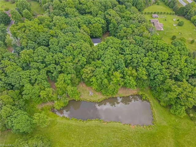 aerial view of property's location featuring a nearby body of water