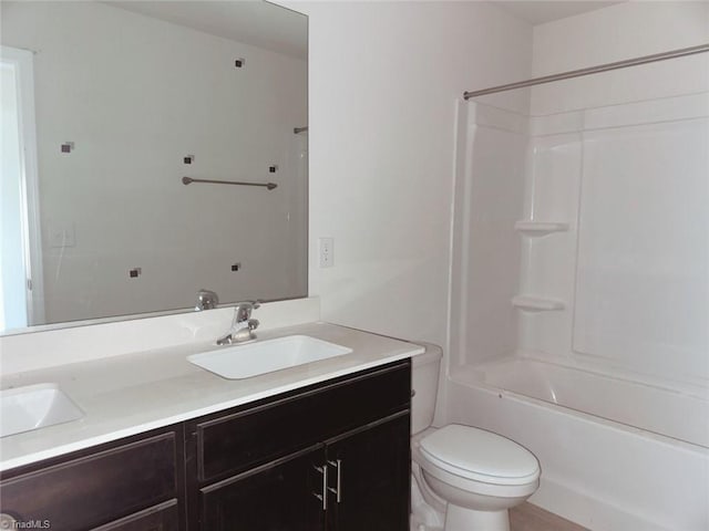 full bathroom featuring shower / bath combination, a sink, toilet, and double vanity