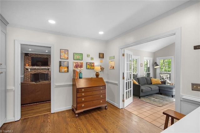 4105 Waldenbrook Rd, Greensboro, NC 27407 - interior space with baseboards, wood finished floors, a brick fireplace, and recessed lighting