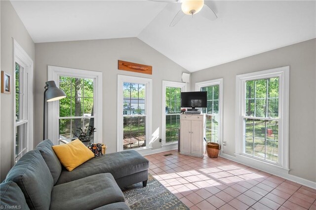 4105 Waldenbrook Rd, Greensboro, NC 27407 - living area featuring vaulted ceiling, baseboards, ceiling fan, and light tile patterned flooring