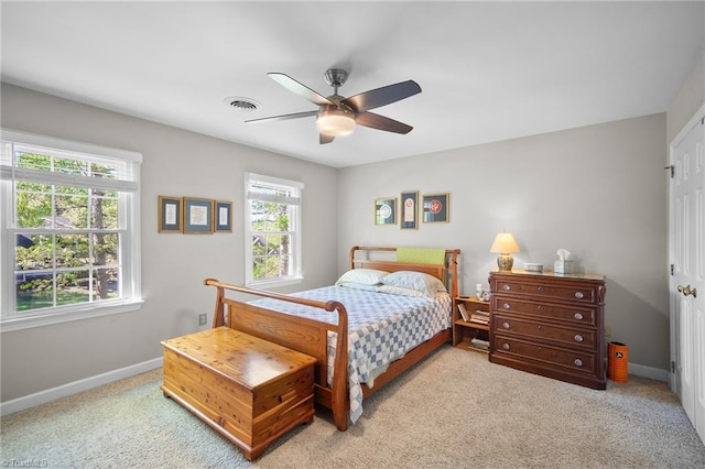 4105 Waldenbrook Rd, Greensboro, NC 27407 - carpeted bedroom featuring visible vents, baseboards, and ceiling fan