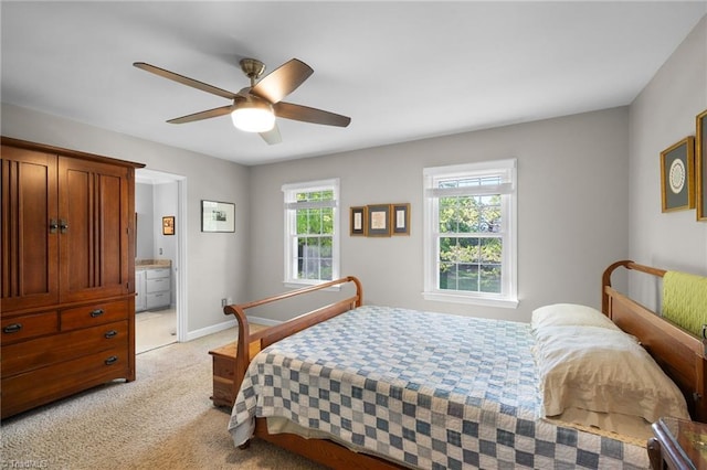 4105 Waldenbrook Rd, Greensboro, NC 27407 - bedroom featuring ceiling fan, ensuite bathroom, baseboards, and light colored carpet
