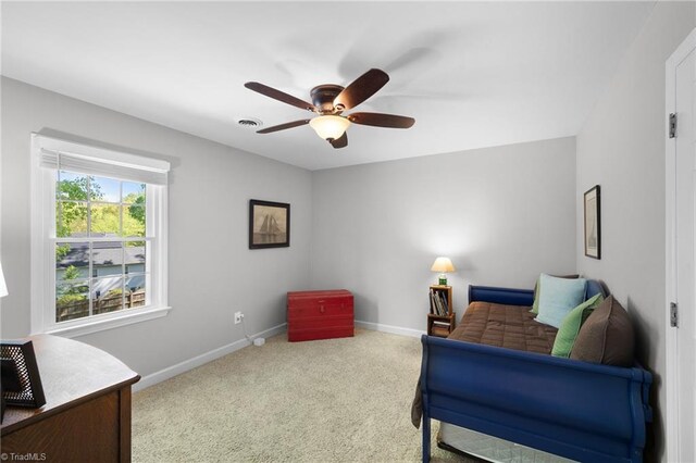 4105 Waldenbrook Rd, Greensboro, NC 27407 - living area featuring baseboards, a ceiling fan, visible vents, and carpet