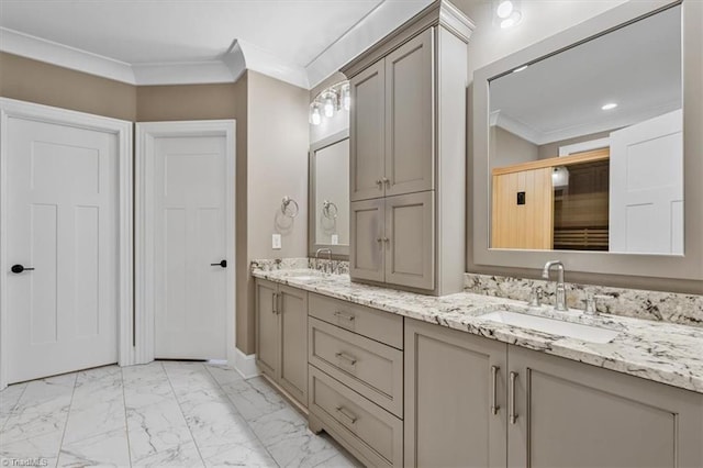 bathroom with vanity and ornamental molding