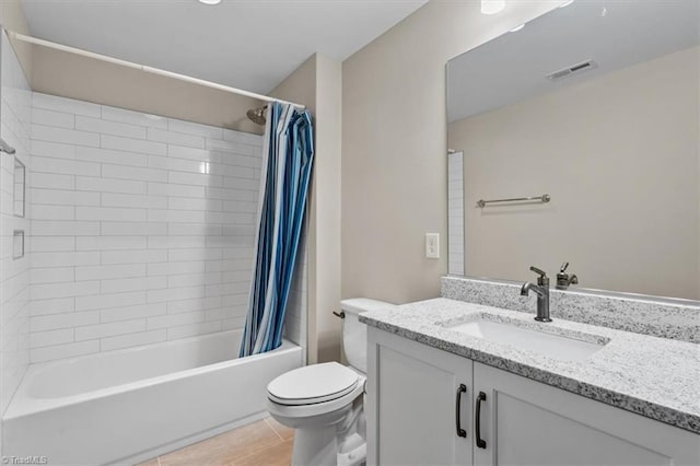 full bathroom with toilet, shower / bath combination with curtain, vanity, and tile patterned floors