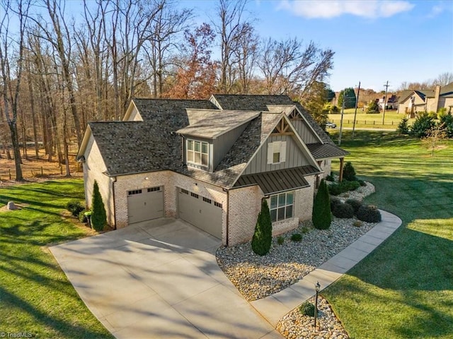 view of front facade featuring a front yard and a garage