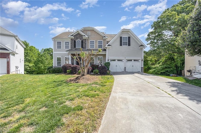 3510 Meadow Glen Ct, Clemmons, NC 27012 - view of front of home with driveway, a garage, and a front yard