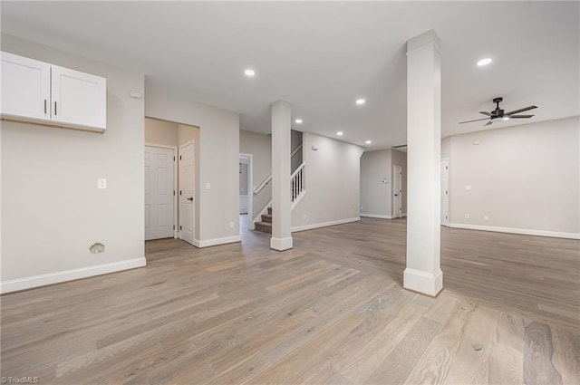 3510 Meadow Glen Ct, Clemmons, NC 27012 - unfurnished living room with recessed lighting, stairway, a ceiling fan, baseboards, and light wood-style floors