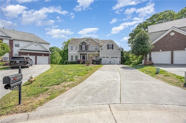 3510 Meadow Glen Ct, Clemmons, NC 27012 - view of front of home with a front lawn and a garage