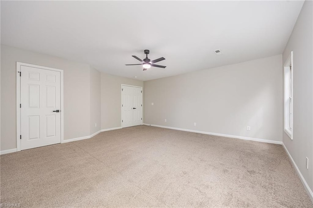 3510 Meadow Glen Ct, Clemmons, NC 27012 - spare room with carpet flooring, baseboards, a ceiling fan, and visible vents