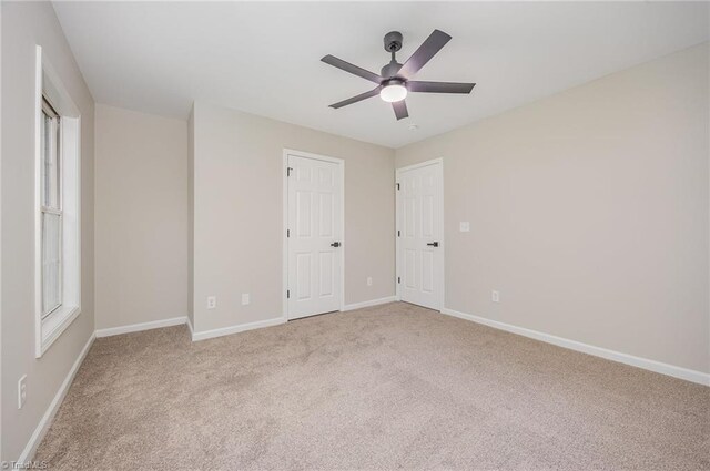 3510 Meadow Glen Ct, Clemmons, NC 27012 - unfurnished bedroom featuring ceiling fan, carpet flooring, and baseboards