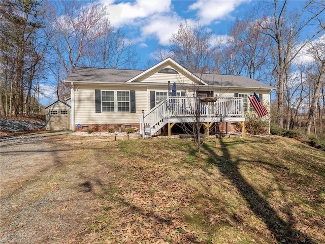 single story home with a deck, an outdoor structure, stairs, crawl space, and a front lawn