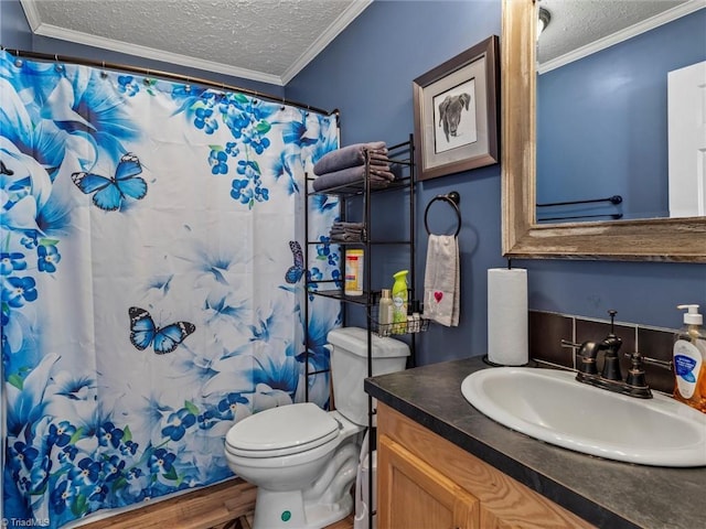 full bathroom featuring a textured ceiling, ornamental molding, toilet, and vanity