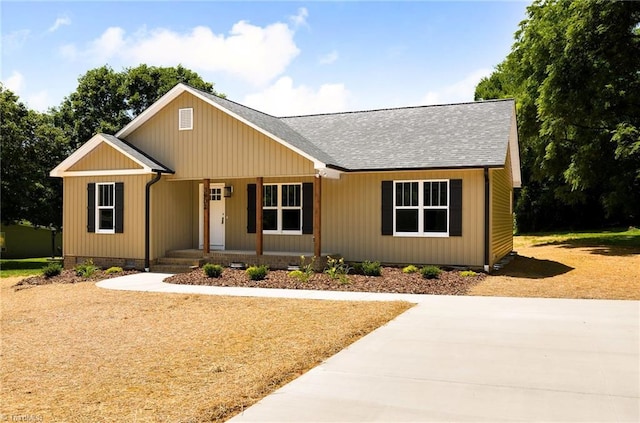 3902 NC Highway 47, Lexington, NC 27292 - ranch-style home featuring covered porch and a shingled roof