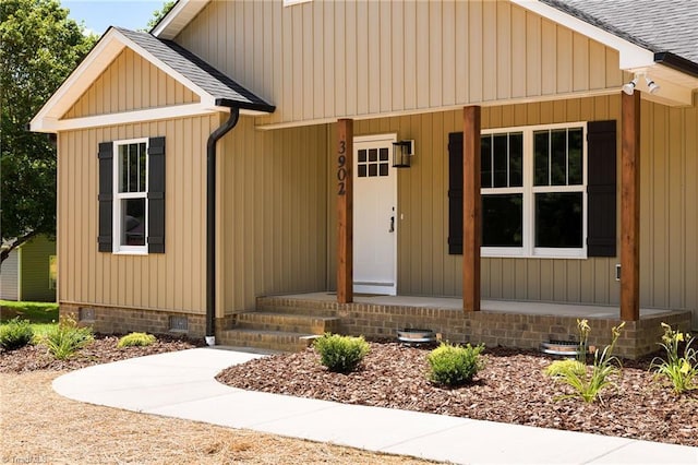 3902 NC Highway 47, Lexington, NC 27292 - view of front facade with crawl space, a shingled roof, and a porch