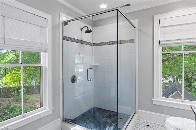 full bath with crown molding, tile patterned floors, a shower stall, healthy amount of natural light, and recessed lighting