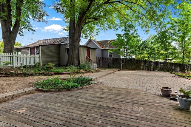 deck featuring an outdoor structure