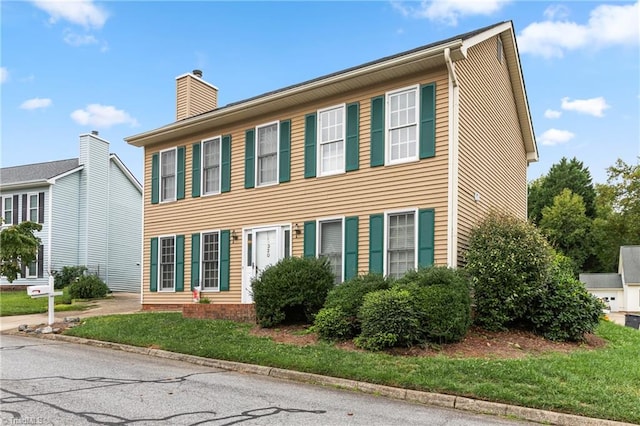 colonial house with a front yard