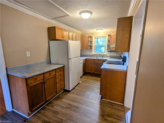 5675 Main St, Bethania, NC 27040 - kitchen with freestanding refrigerator, range, a textured ceiling, dark wood finished floors, and open shelves